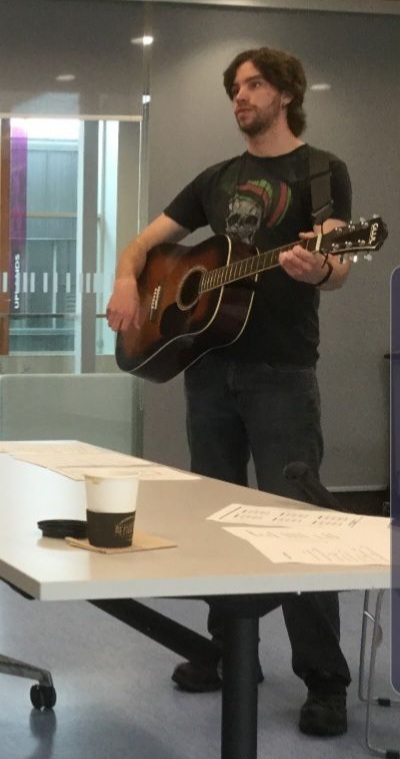 Dylan playing guitar