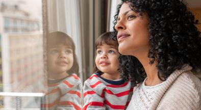 Mother and child looking out the window