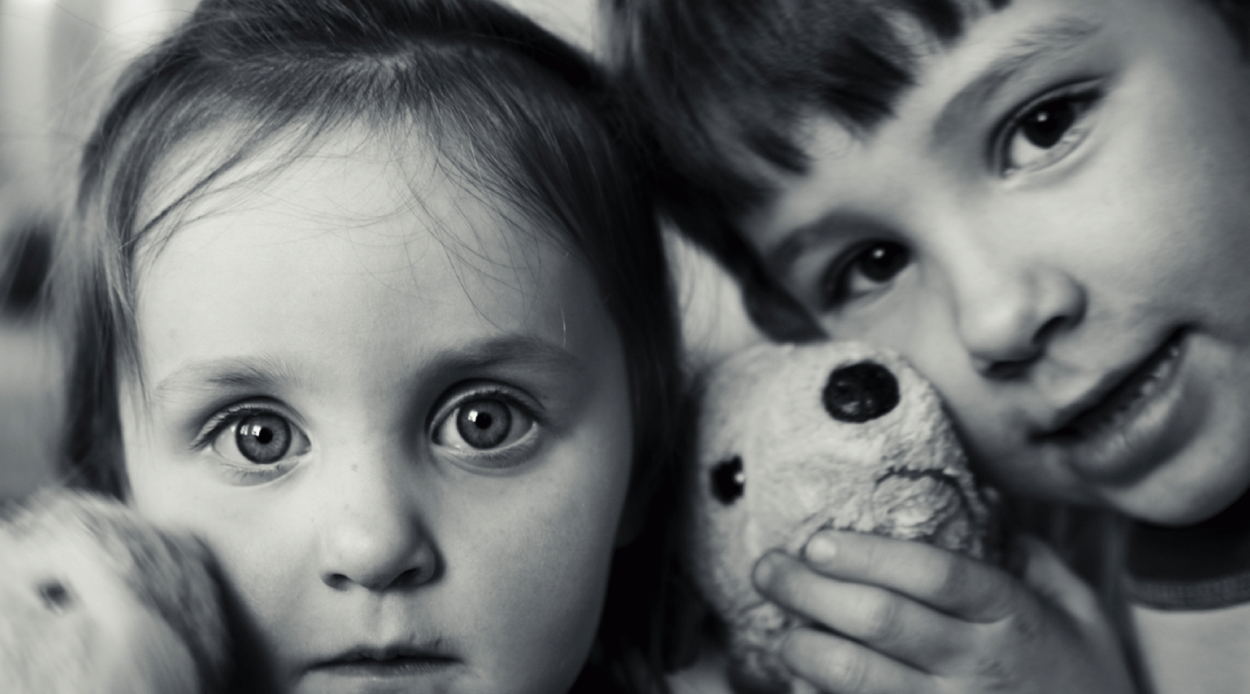 Boy and Girl with their stuffed toys.