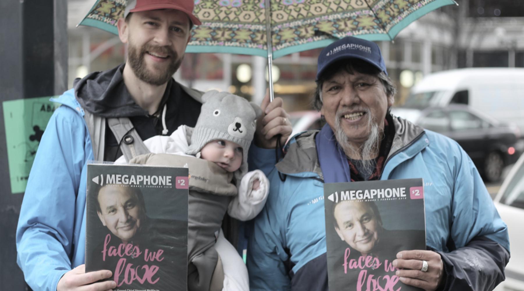 Former Vancity Community Foundation executive director Derek Gent joins vendor Bob Dennis for Megaphone Magazine’s annual Big Sell on January 20, 2018.