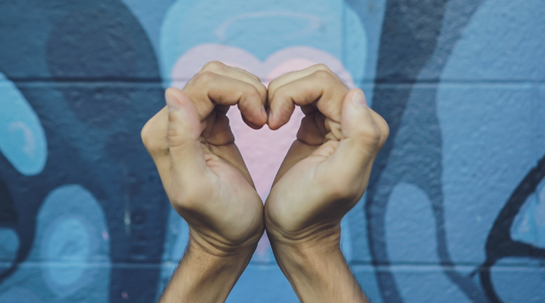 Heart shaped hands together