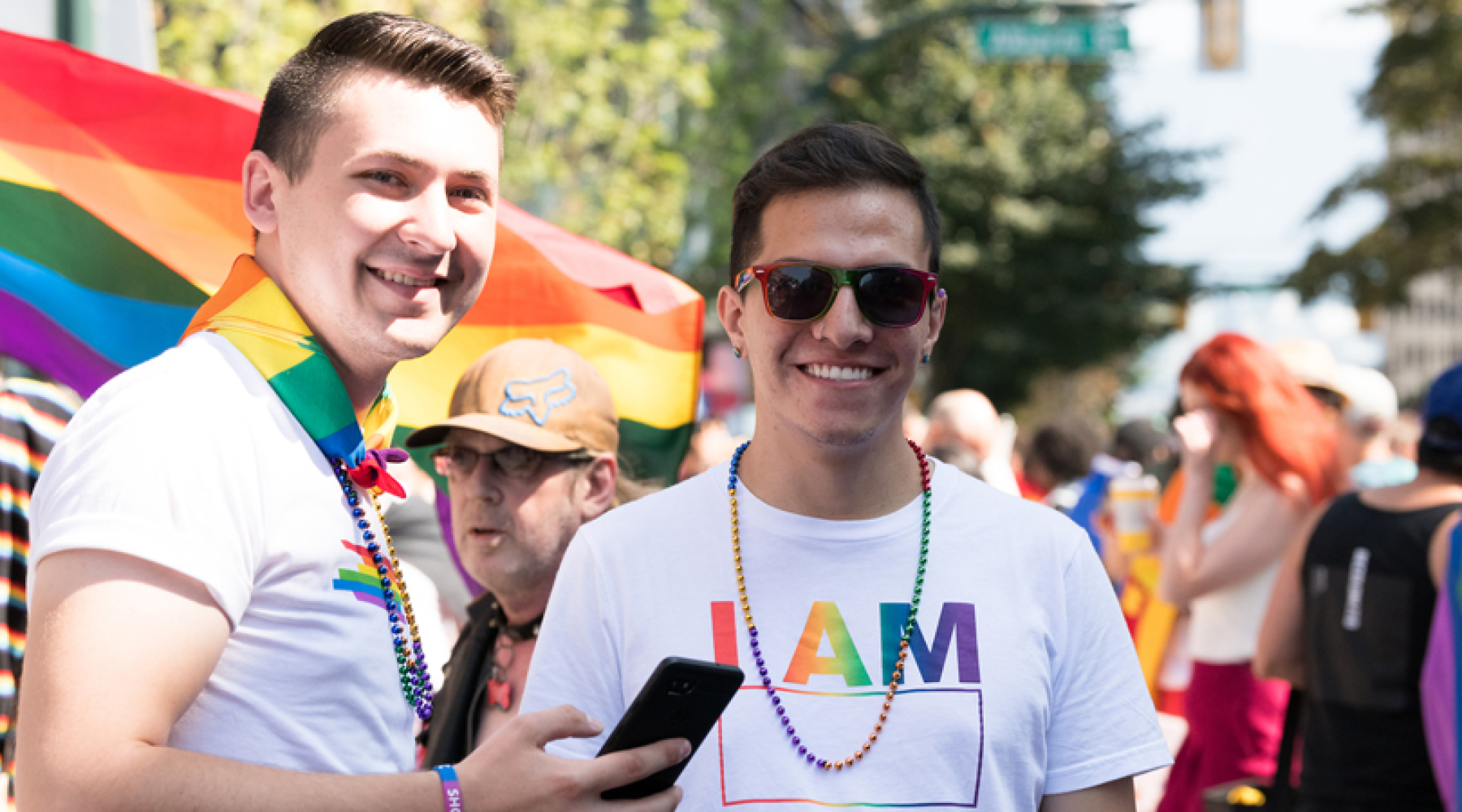 Two folks celebrating at the Pride Parade